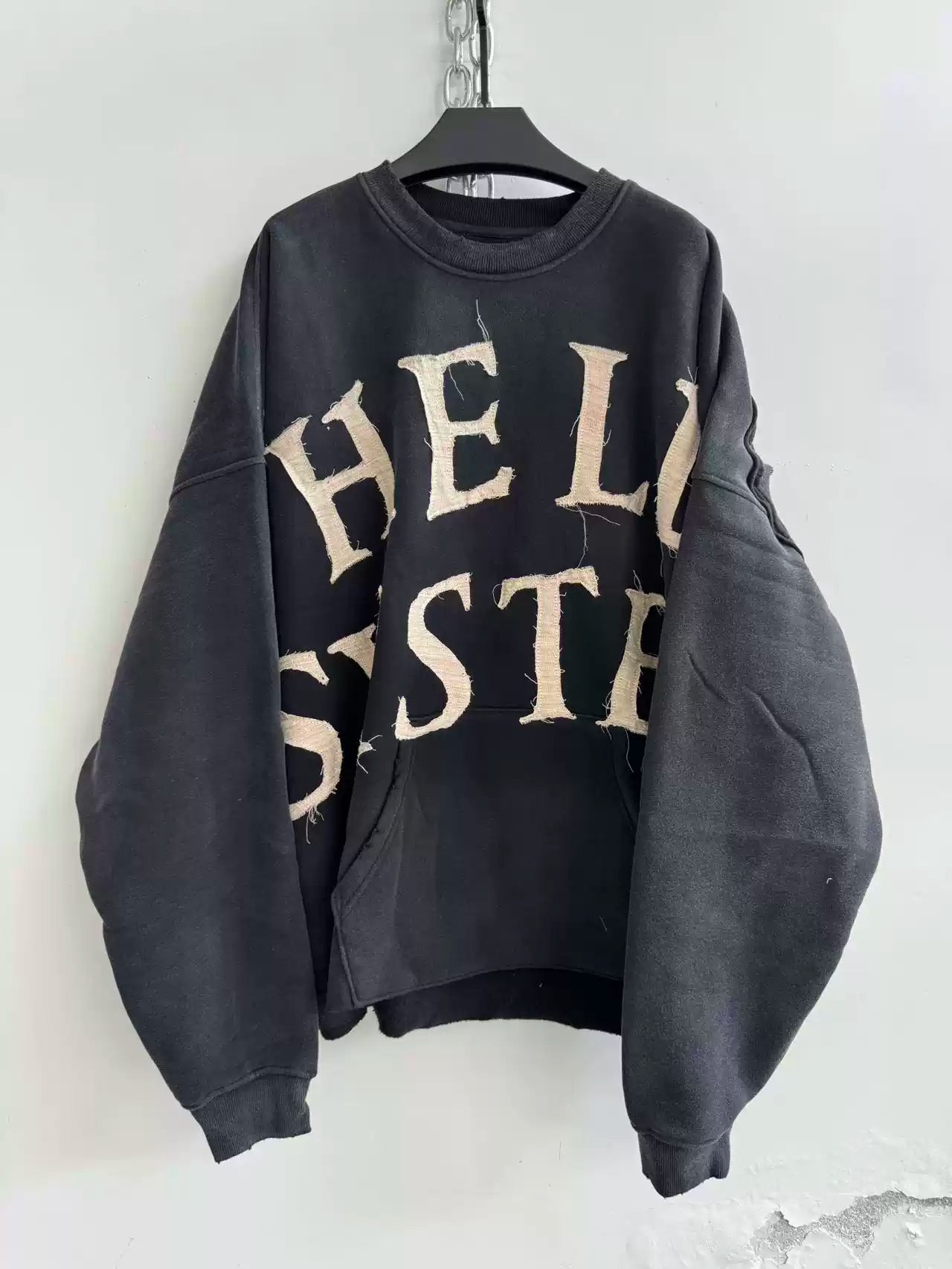 DECONSTRUCTED APPLIQUÉ SWEATSHIRT