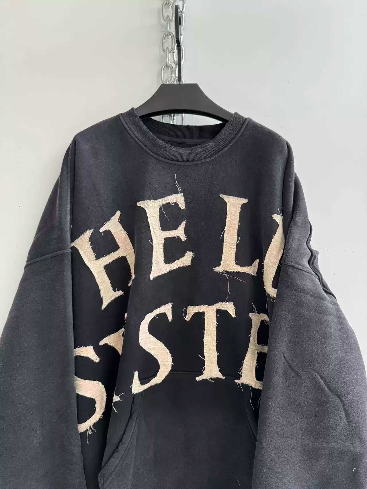 DECONSTRUCTED APPLIQUÉ SWEATSHIRT