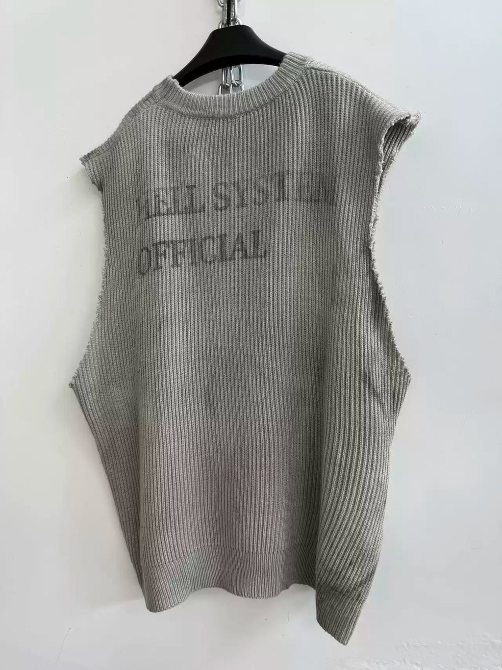 DISTRESSED KNIT VEST