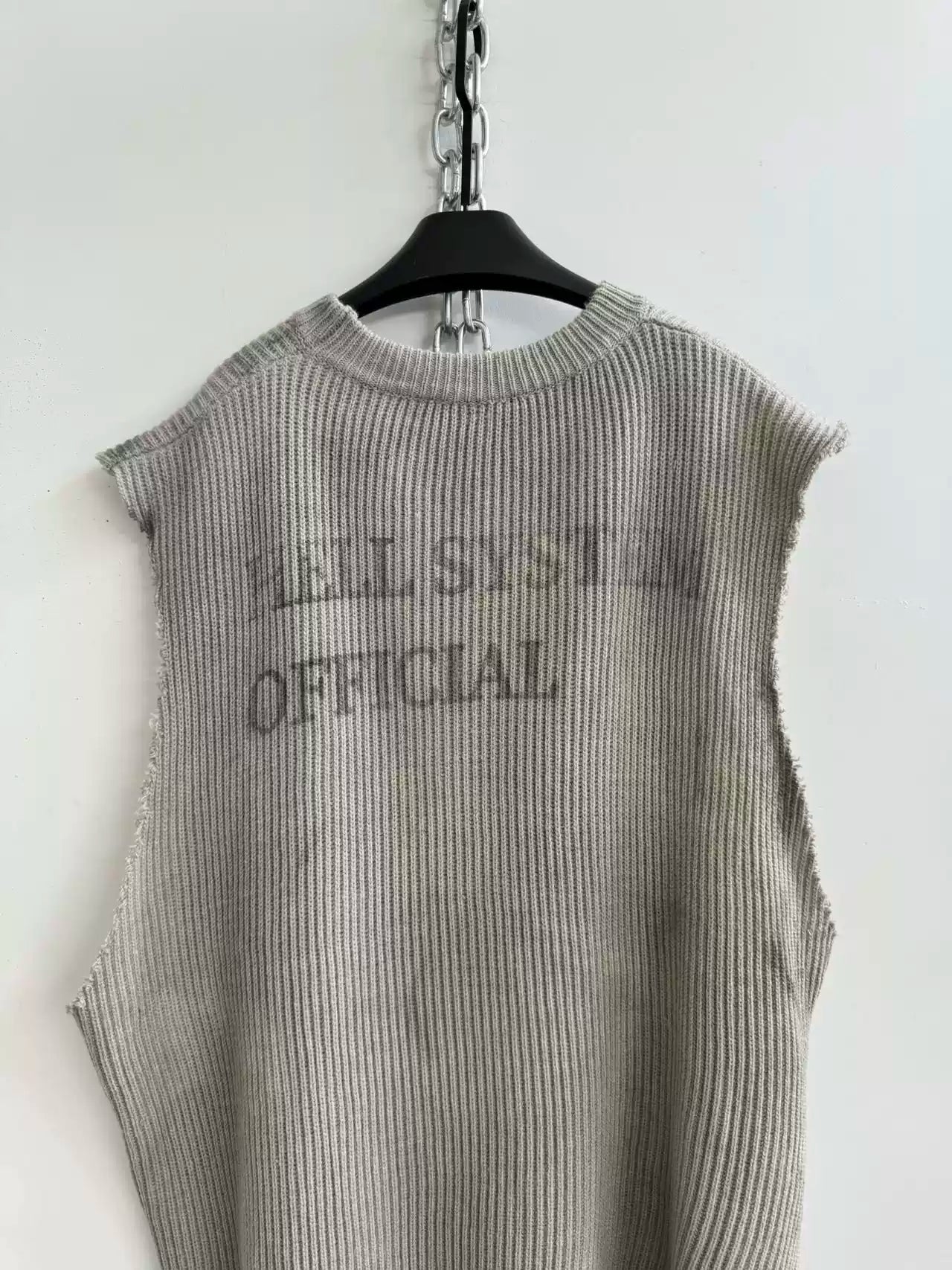 DISTRESSED KNIT VEST