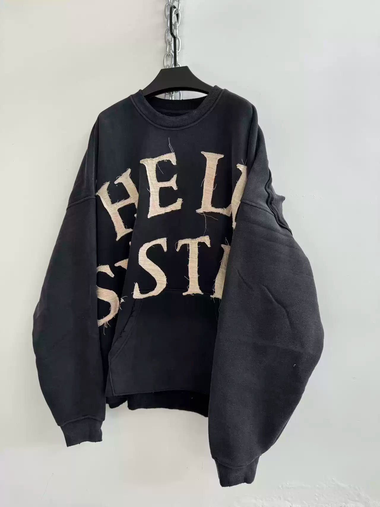 DECONSTRUCTED APPLIQUÉ SWEATSHIRT