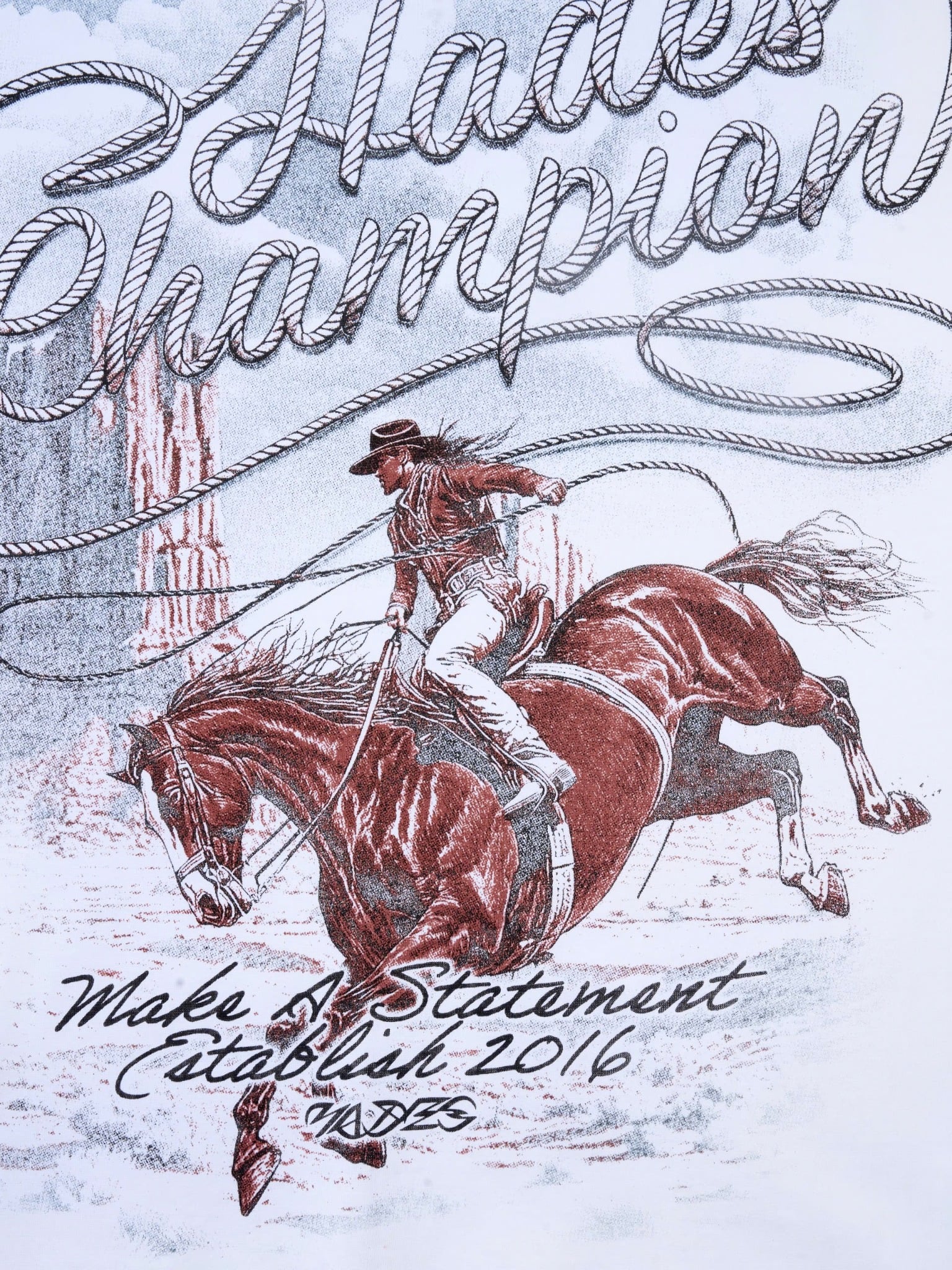 LASSO CHAMPION TEE